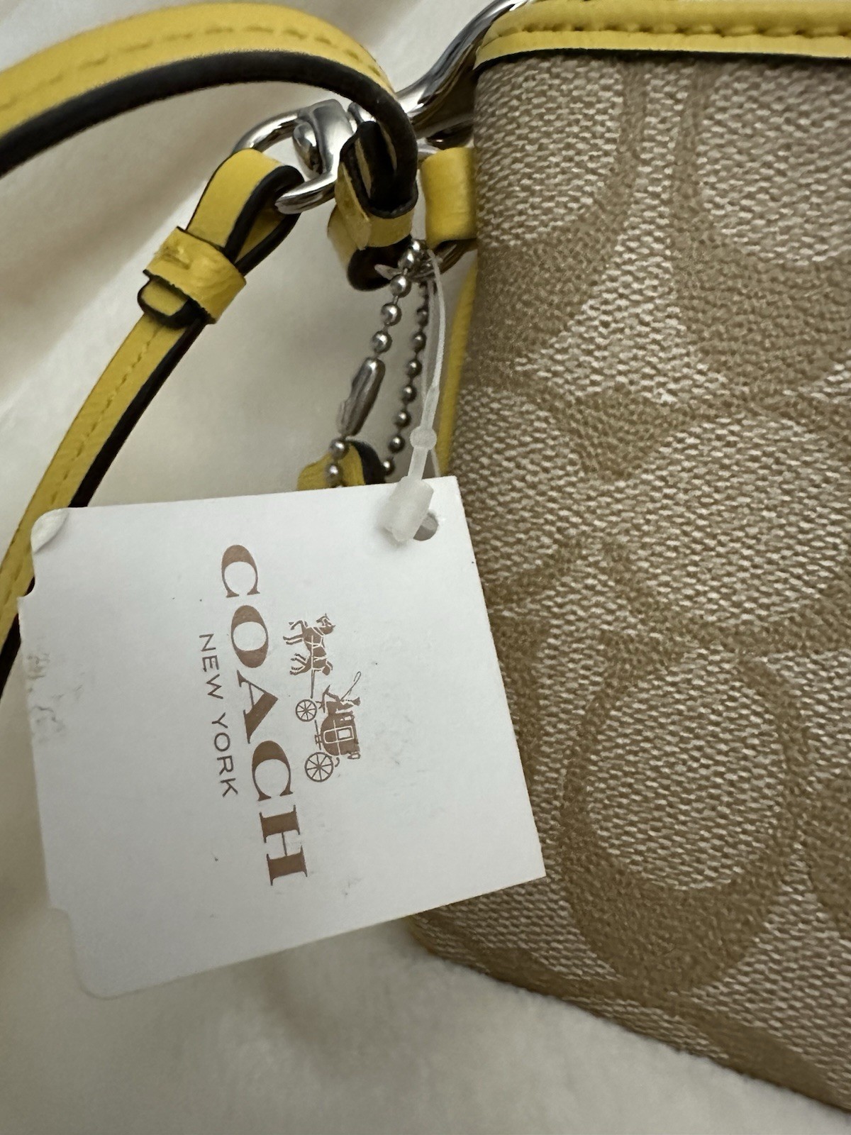 NWT Coach Signature Canvas Light khaki And Yellow Wristlet, Corner zip