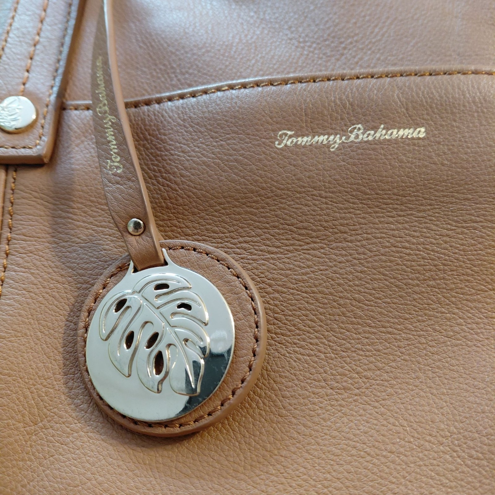 Tommy Bahama big leather bag accent stitching logo hangtag