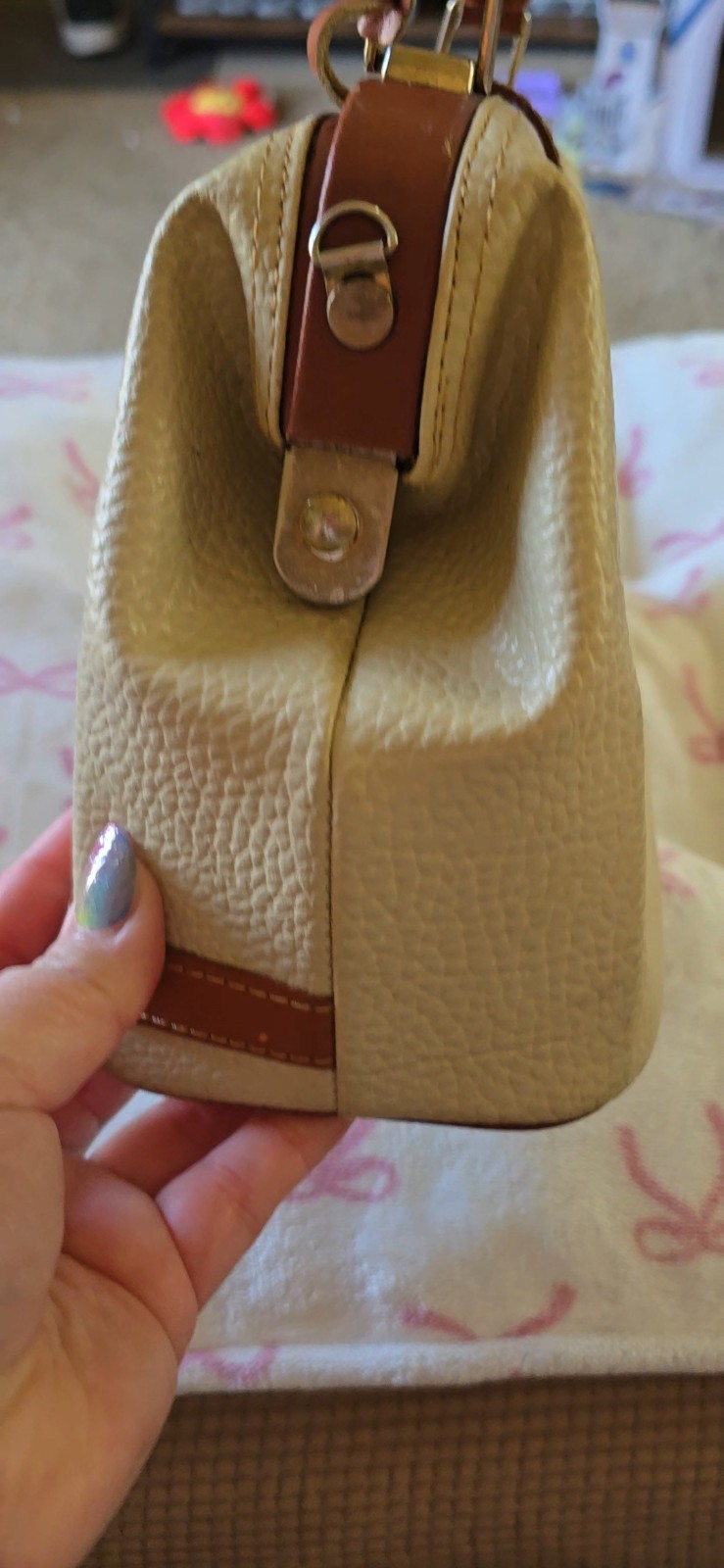 Dooney And Bourke Vintage all weather leather purse. 11 inches across and 7 t