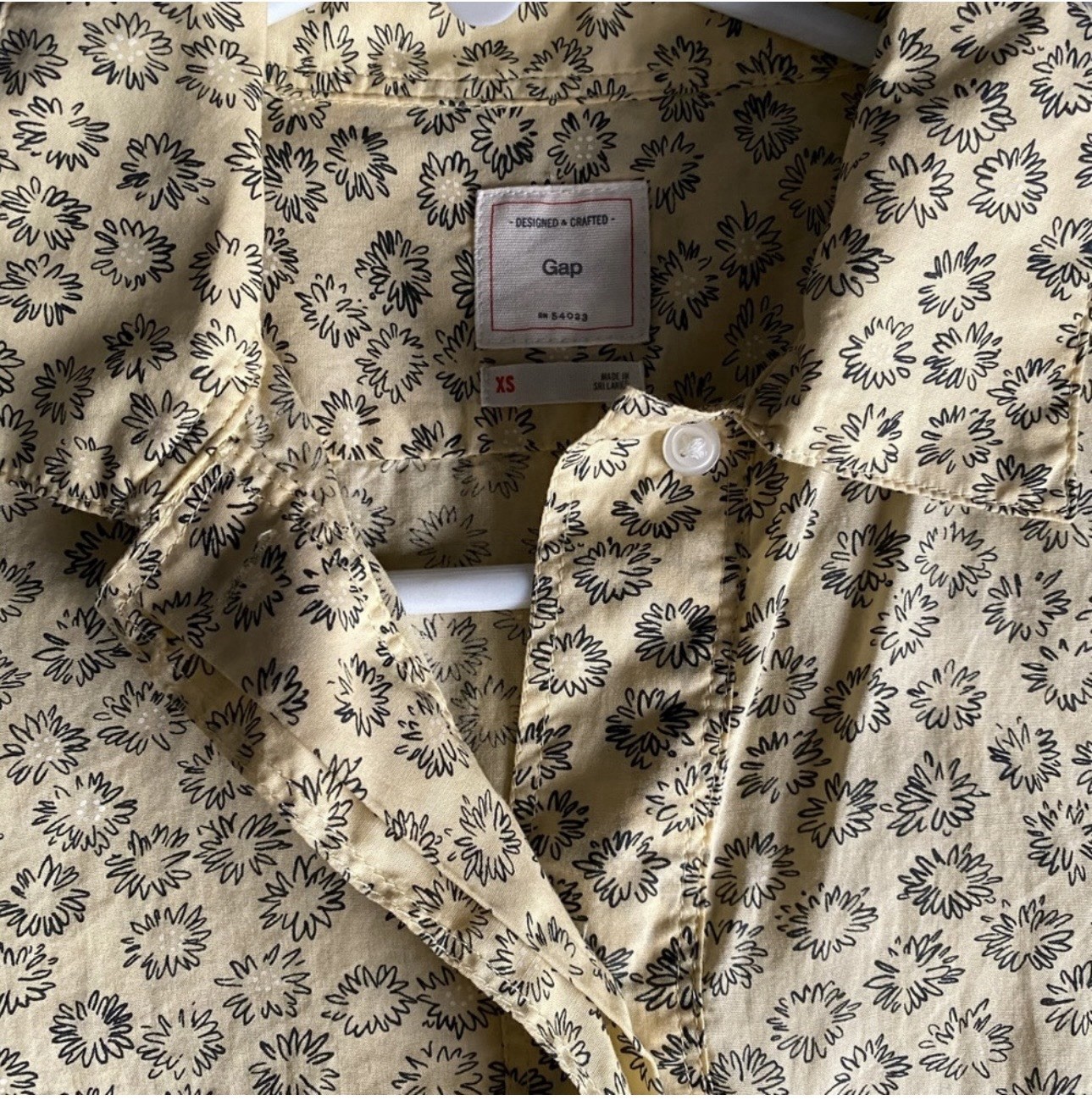 Gap Women’s XS Light pastel yellow with black flowers blouse