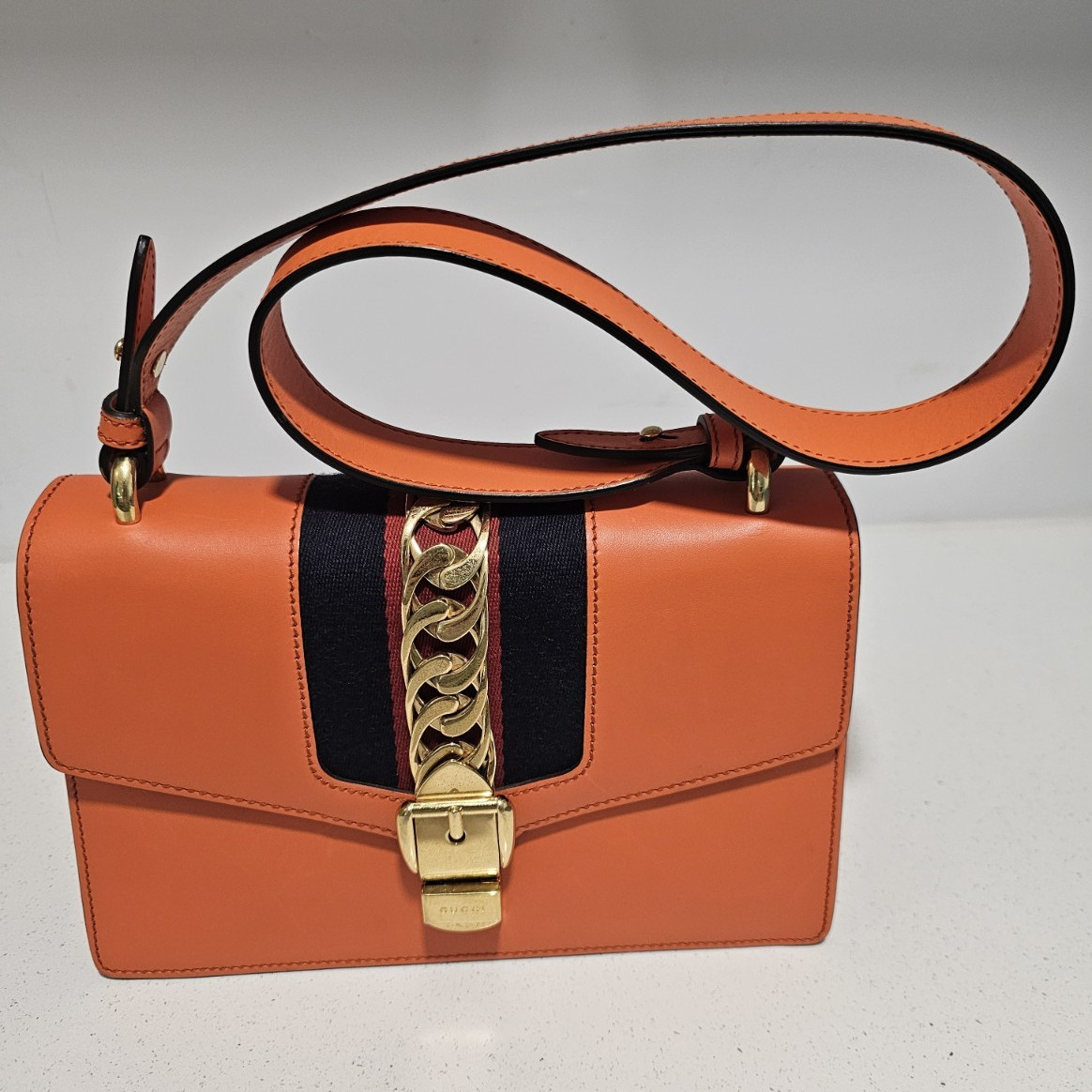 Gucci Women’s Orange Striped Shoulder Bag, Gold Chain Lock, Detachable Strap
