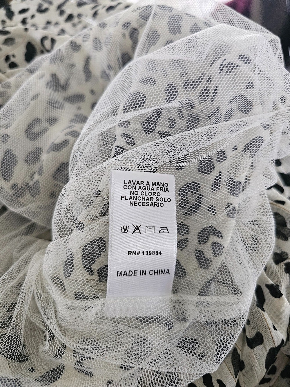 Size S Women’s Black and White Leopard Print Blouse