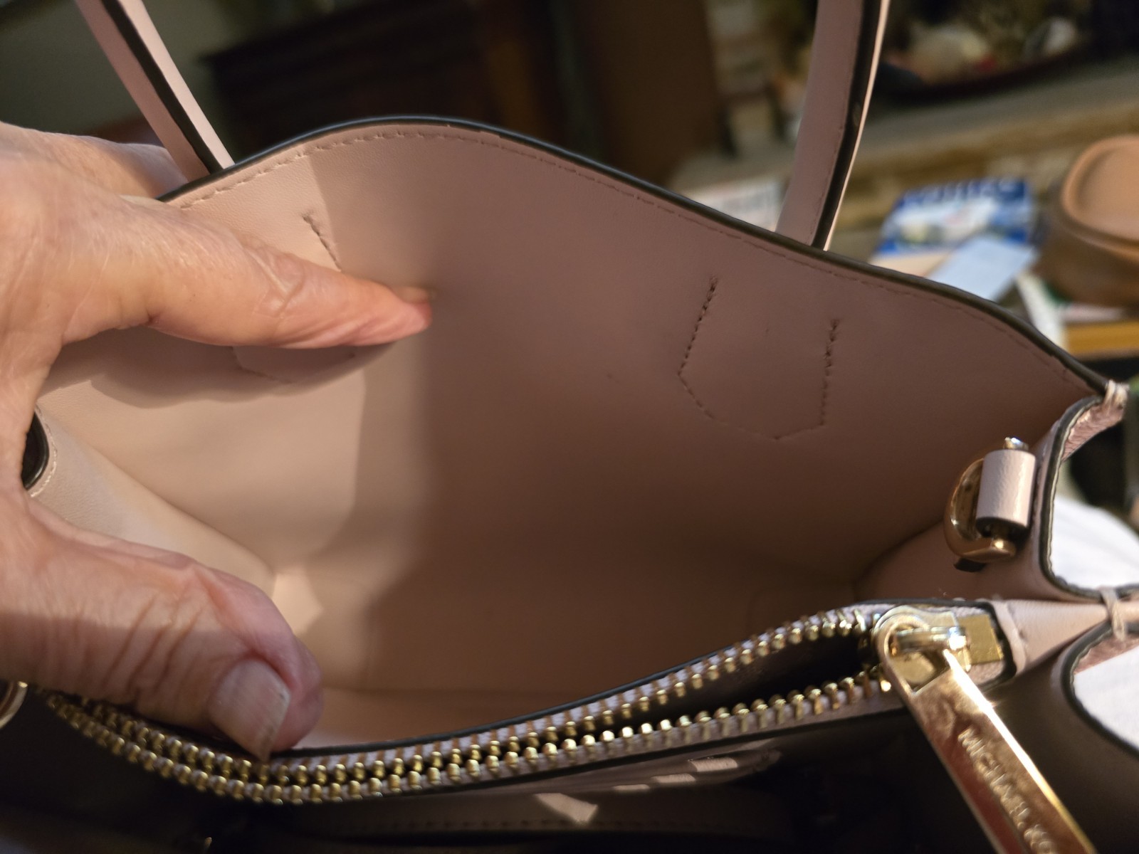 Michael Kors Pink Powder Blush Leather Bag is 10 x 9″ and 6″ deep