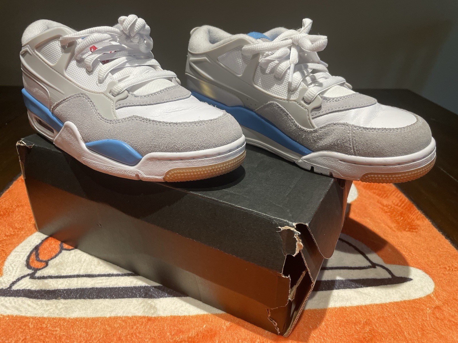 Air Jordan 4 RM (GS) in White / Neutral Grey / University Blue 6.5