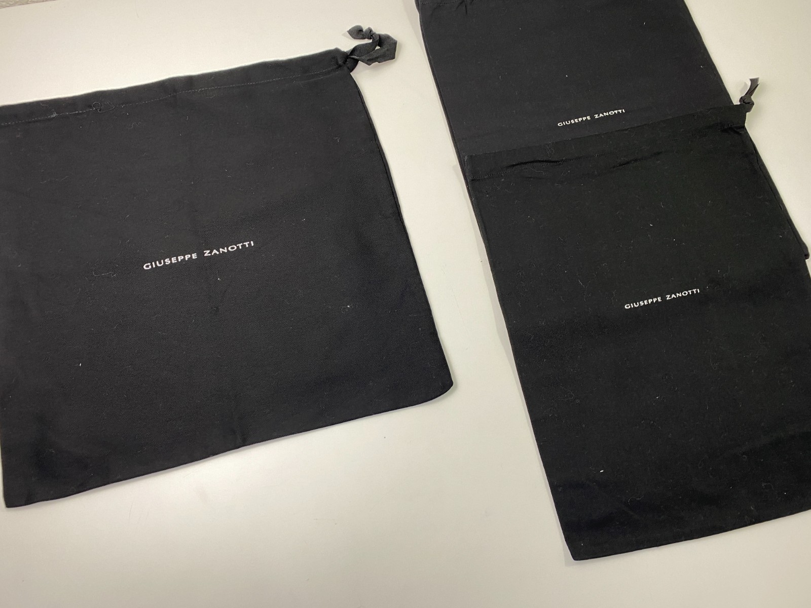 Authentic GIUSEPPE ZANOTTI black dust bags: 15″x 15″ — 12″x 16″