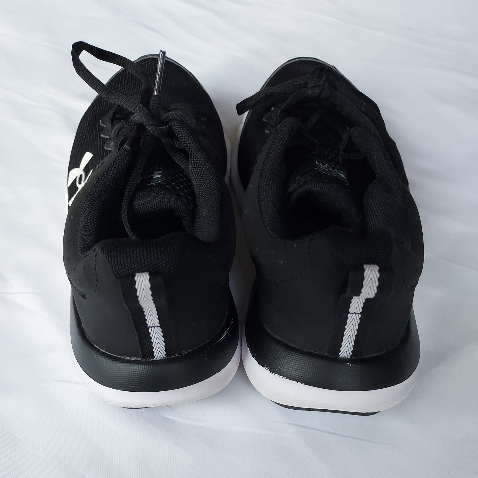 Under Armour Charged Assert 10 Black White Women’s Running Sneakers Athletic
