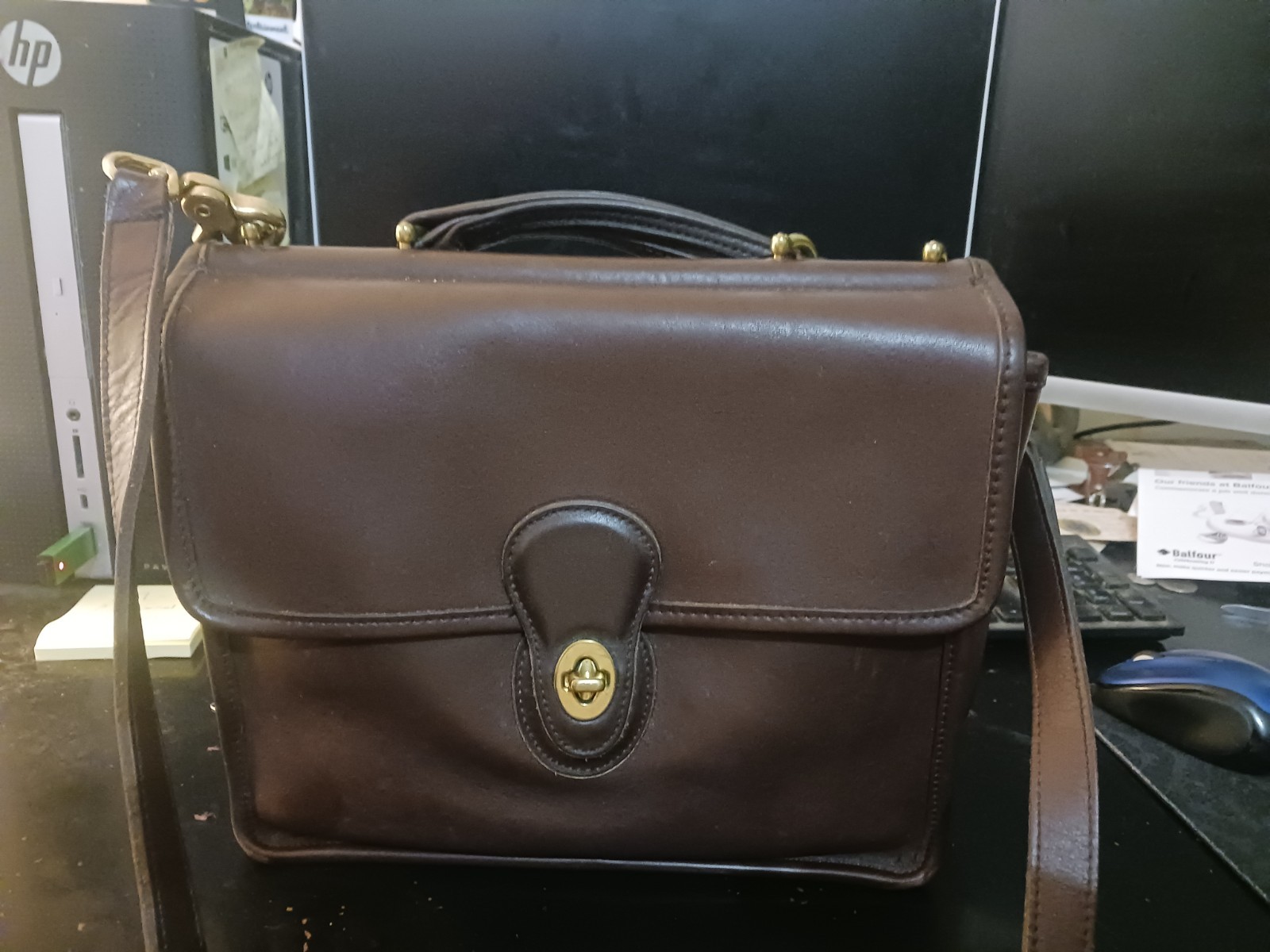 No. E80-9927 identifies your bag as a Coach Willis Bag, Style 9927 made in 1990.
