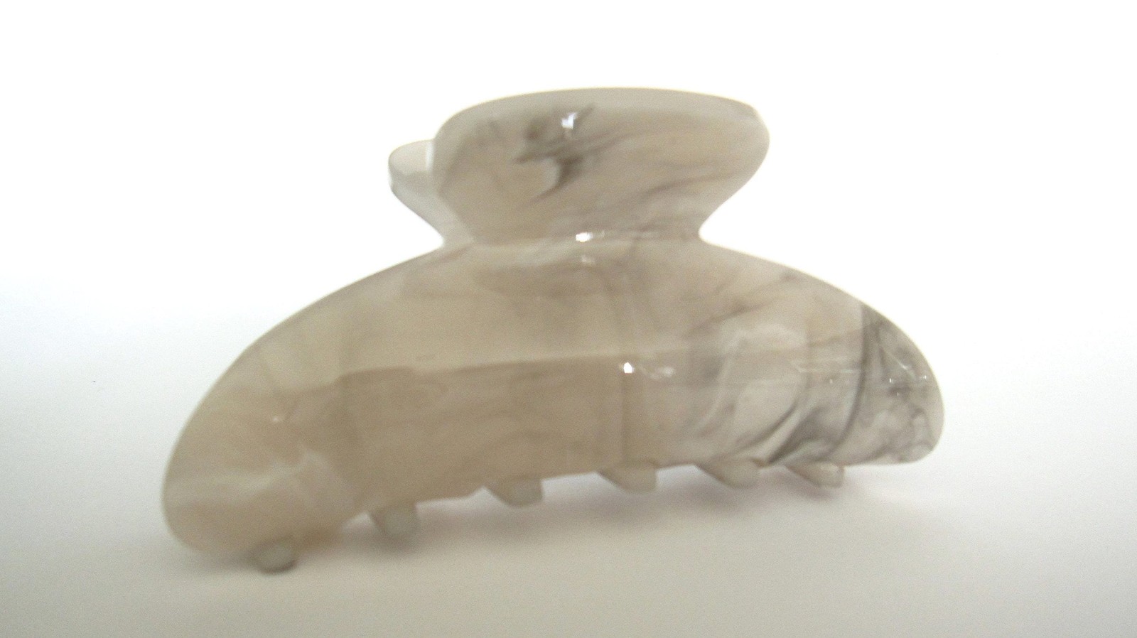 One random marbled beige white black gray acrylic hair claw clip