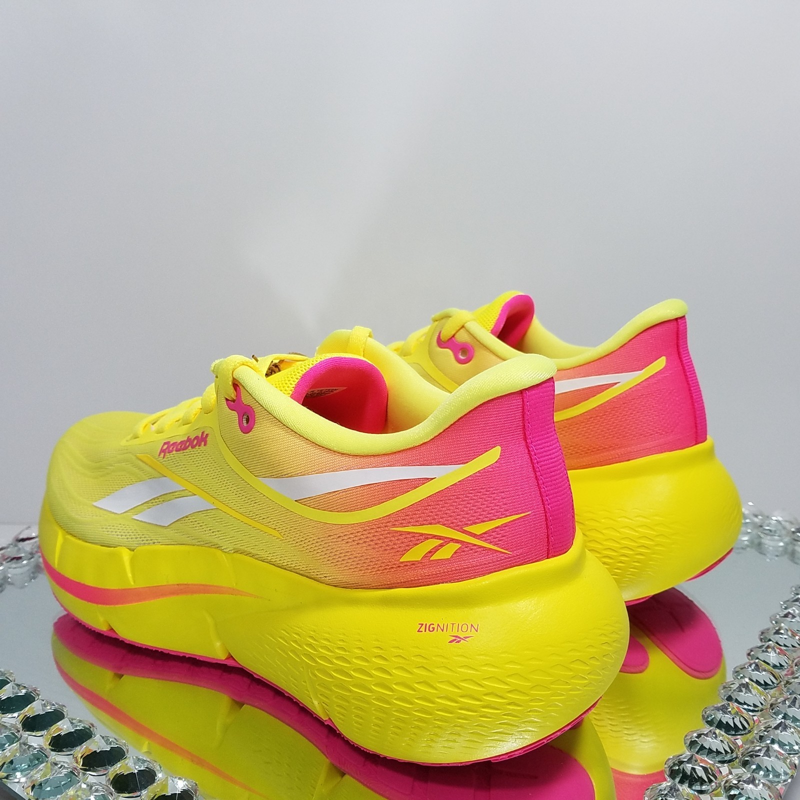 Reebok Zignition “Electric Yellow Atomic Pink” – Women’s Size 7.5 – 100233834