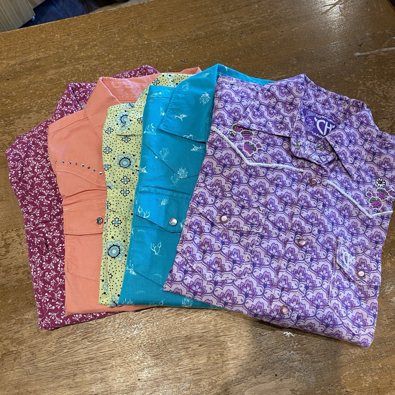 Children’s (Girls) Medium rodeo 4h show shirts. Assorted brands. Long Sleeve.