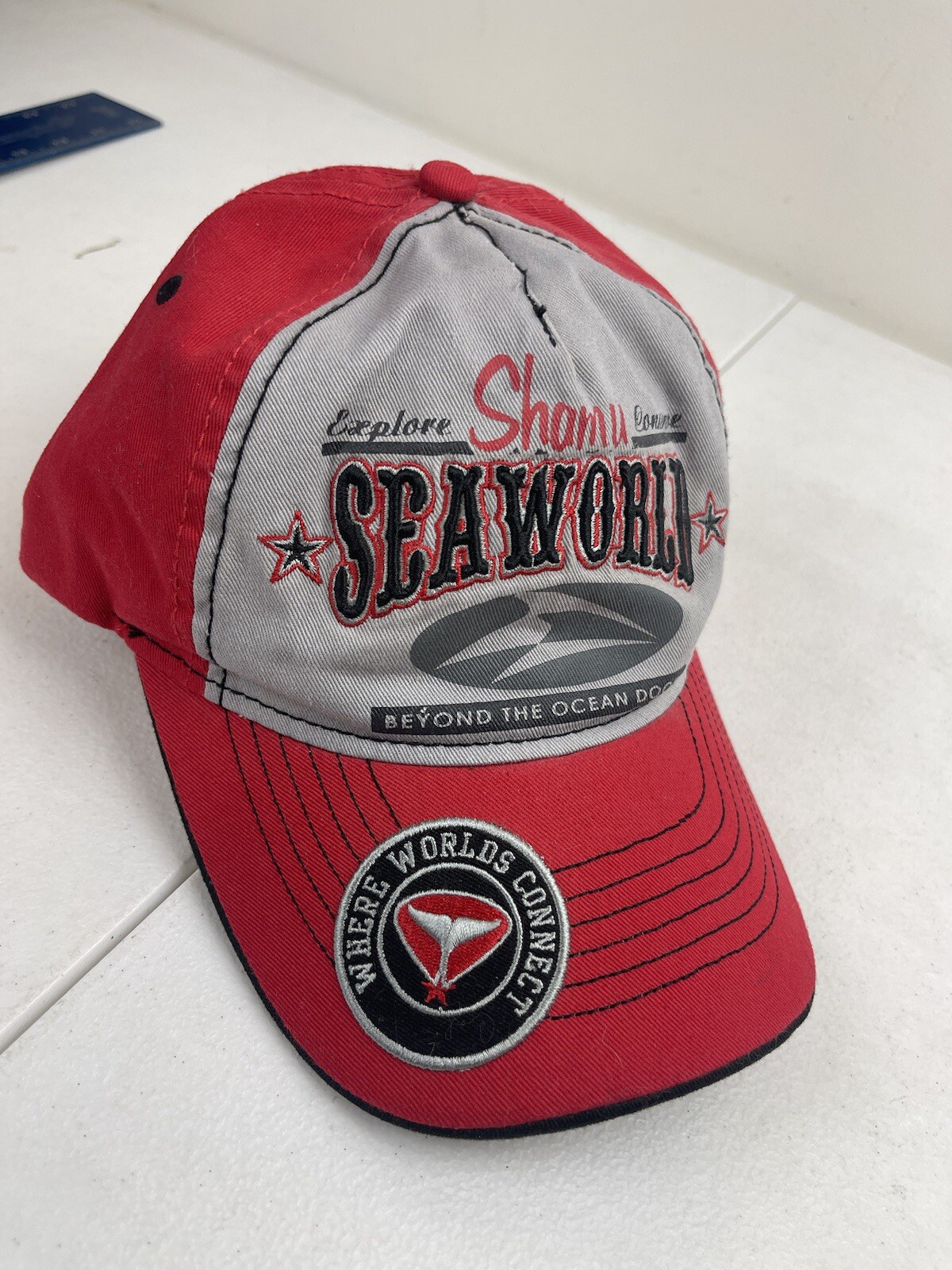 Sea World Shamu Hat Explore Conserve Beyond Ocean Floor Red Grey Strapback Cap