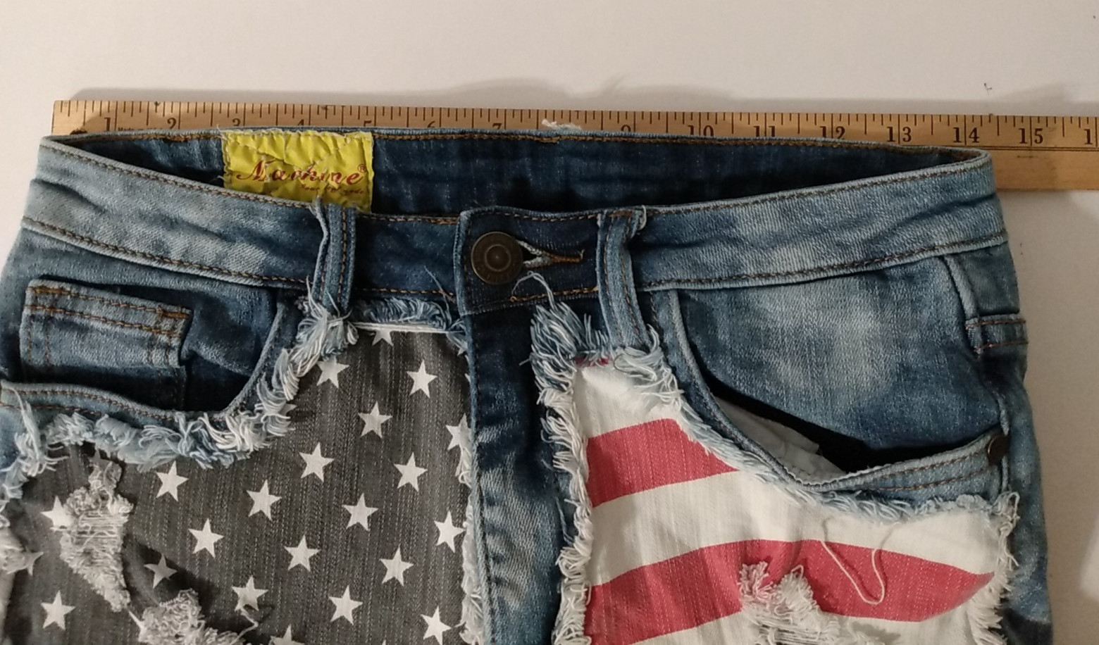 Machine Jeans Women’s Shorts waist measures 28 in. Distressed Flag, tag size 30″