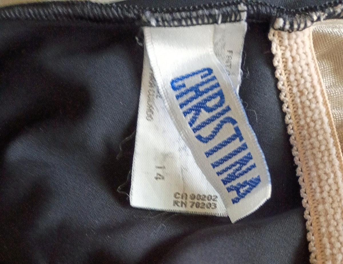 Christina 80% nylon, 20% spandex solid black skirted swimsuit Size 14