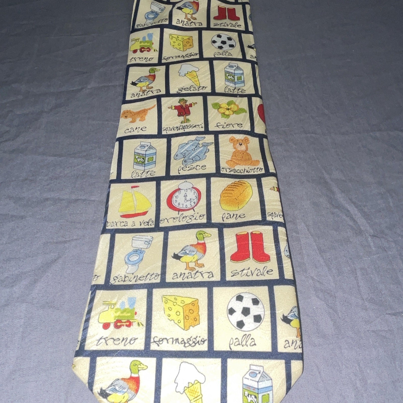 Museum Artifacts Beige/Multicolor Novelty Silk Woven Pointed Men’s Tie Logo