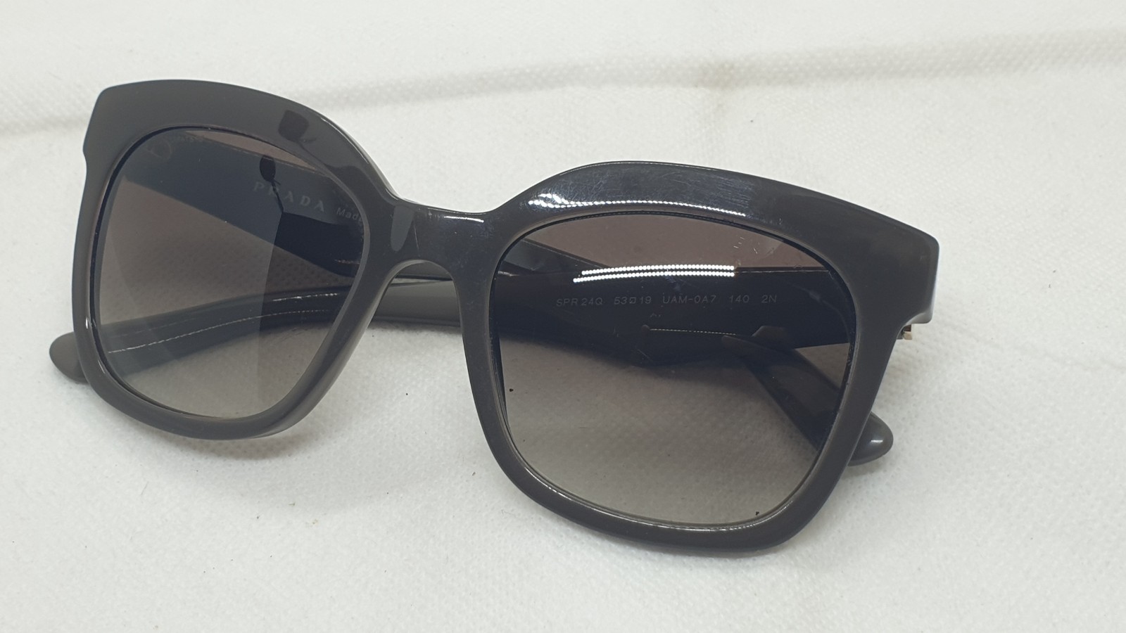 Prada SPR 24Q UAM-0A7 Sunglasses. Made in italy