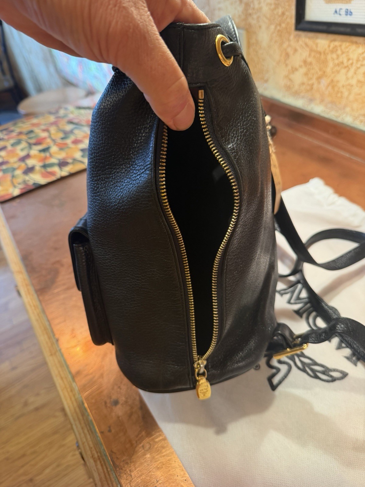 MCM Black Drawstring Backpack, Magnetic Closure, Gold Hardware, Dust Bag