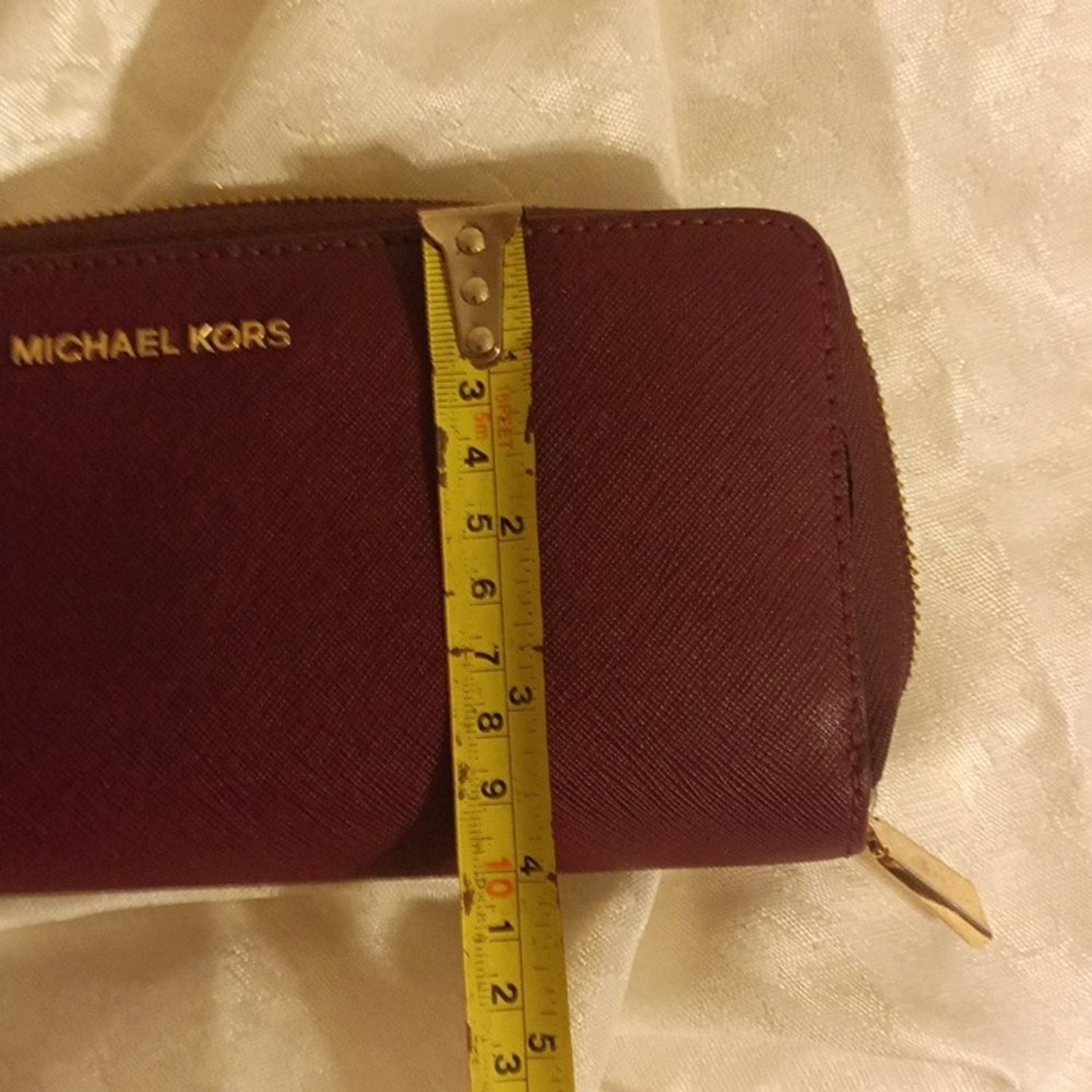 Michael Kors large Saffiano burgundy color leather accordion wallet/ wri…