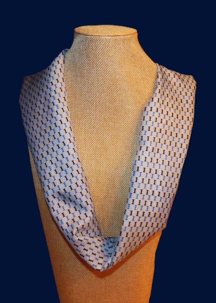 Oblong abstract scarf; blue tones, white; polyester; 54 x 10.5 inches