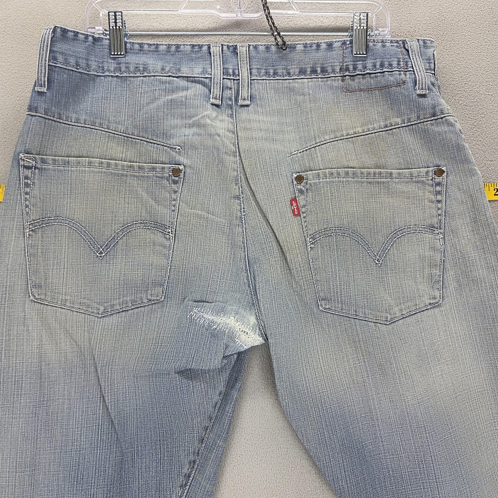 VTG Levis Engineered Jeans Mens Blue Twisted Button Fly Altered Hem Fits 34×32