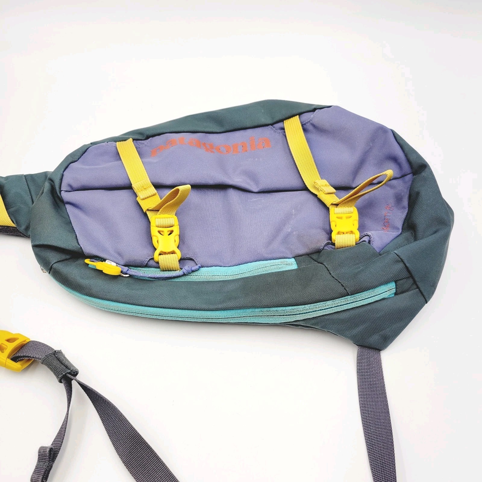 Patagonia Atom Sling Bag 8L Purple Gray Yellow Crossbody Backpack