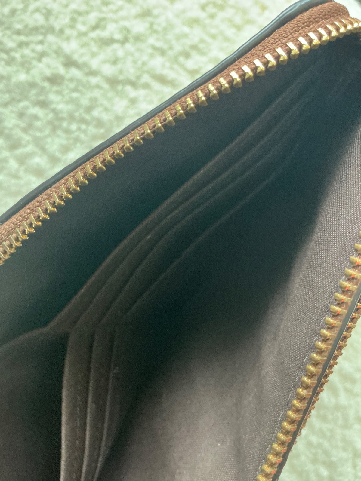 Coach wristlet/chestnut brown/light use