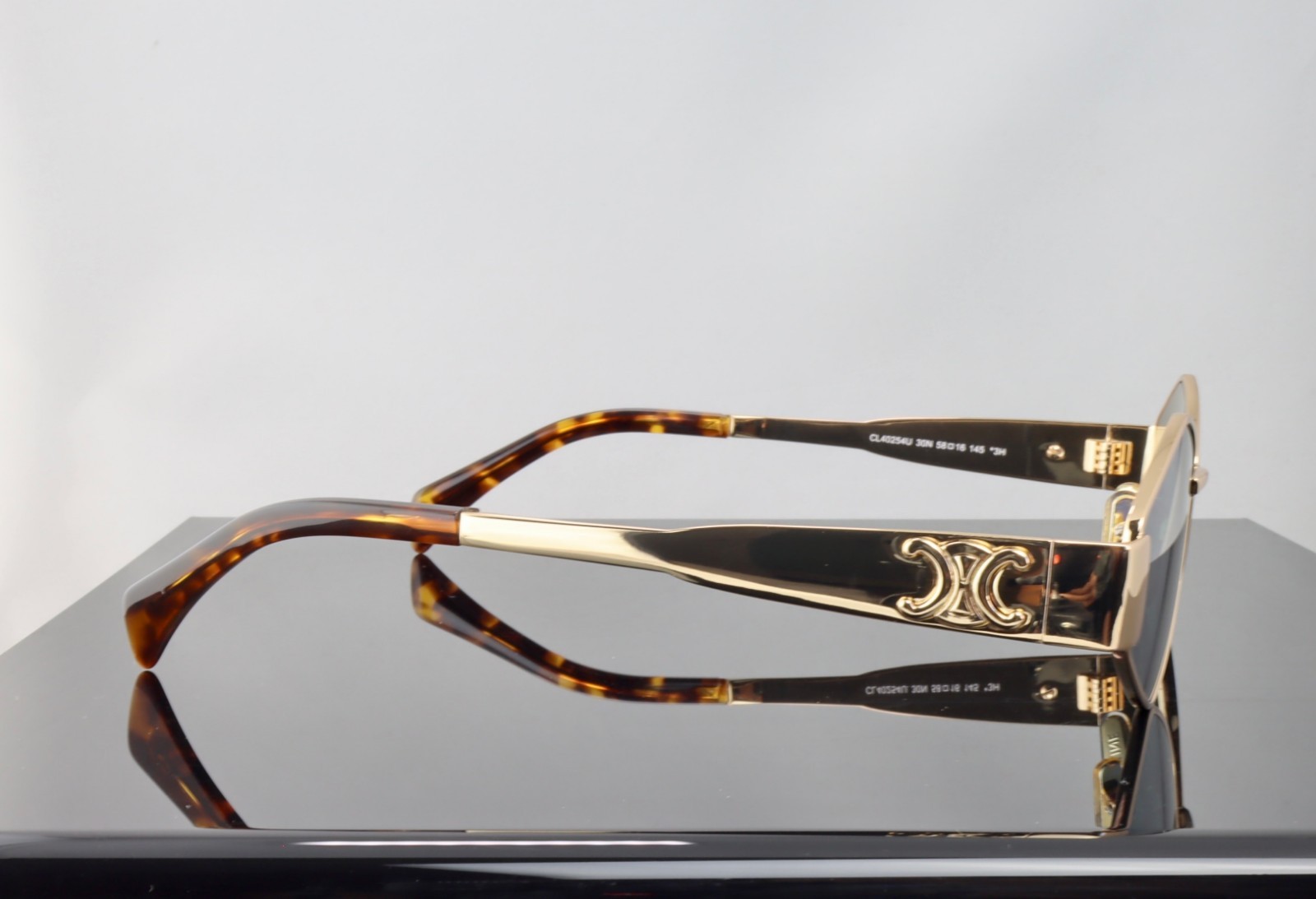 Celine Triomphe Metal CL40254U 30N Gold / Green Lenses Geometric Sunglasses