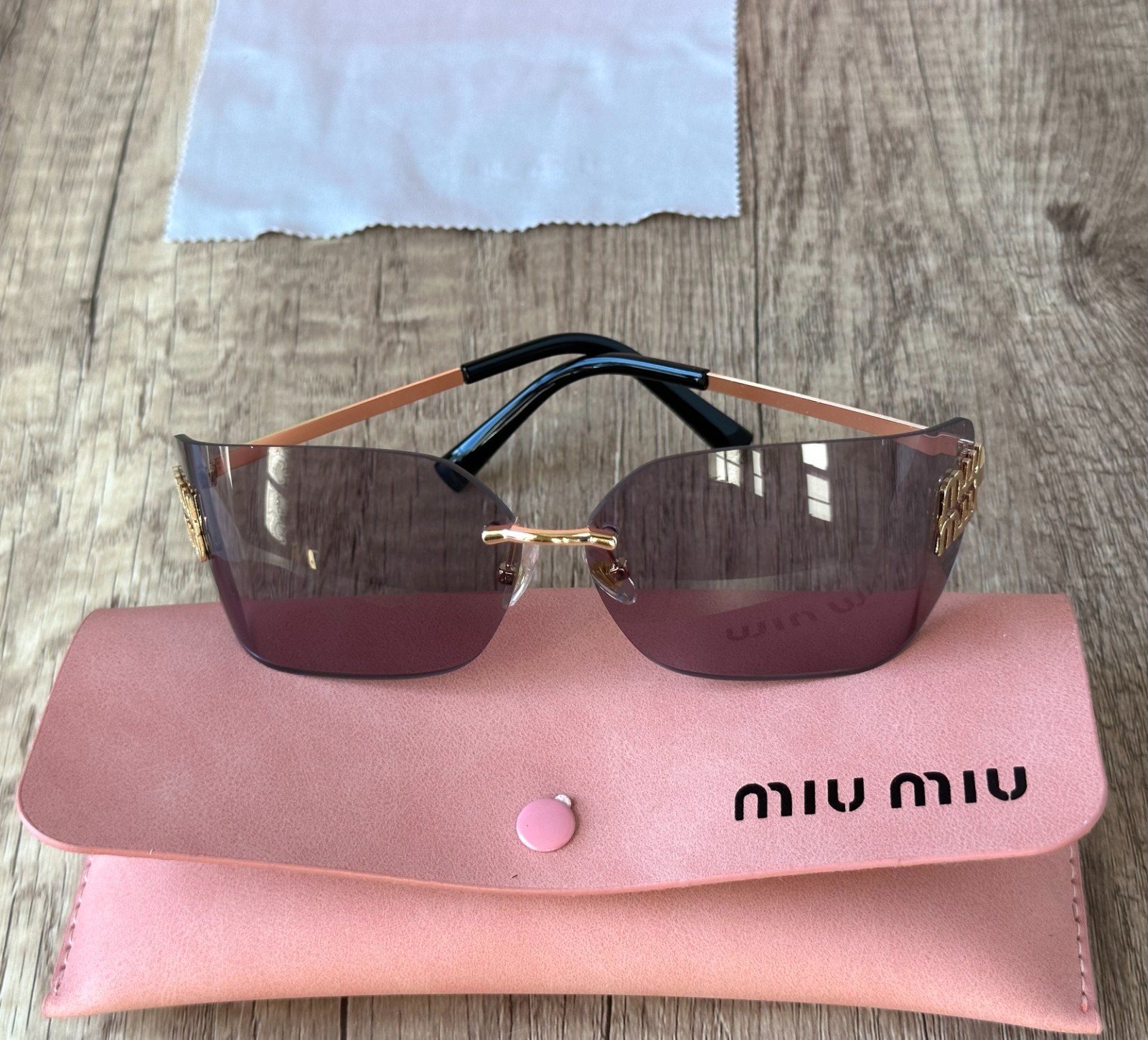 MIU MIU SUNGLASSES BLACK GRAY 100% AUTHENTIC WITH ORIGINAL PACKAGE SHIELD