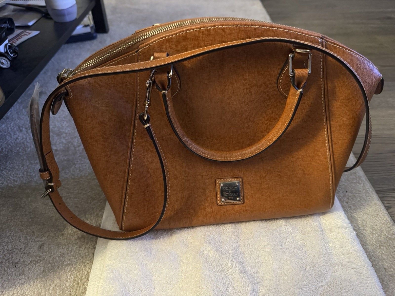 Dooney and Bourke 1975 Saffiano Leather Sydney Satchel Domed cross body.