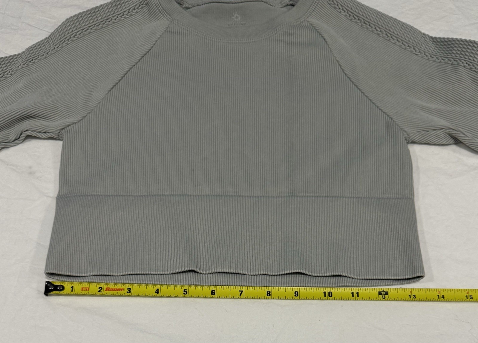 Offline by Aerie Big Chill Seamless Long Sleeve Crop Top in a grey/stone color