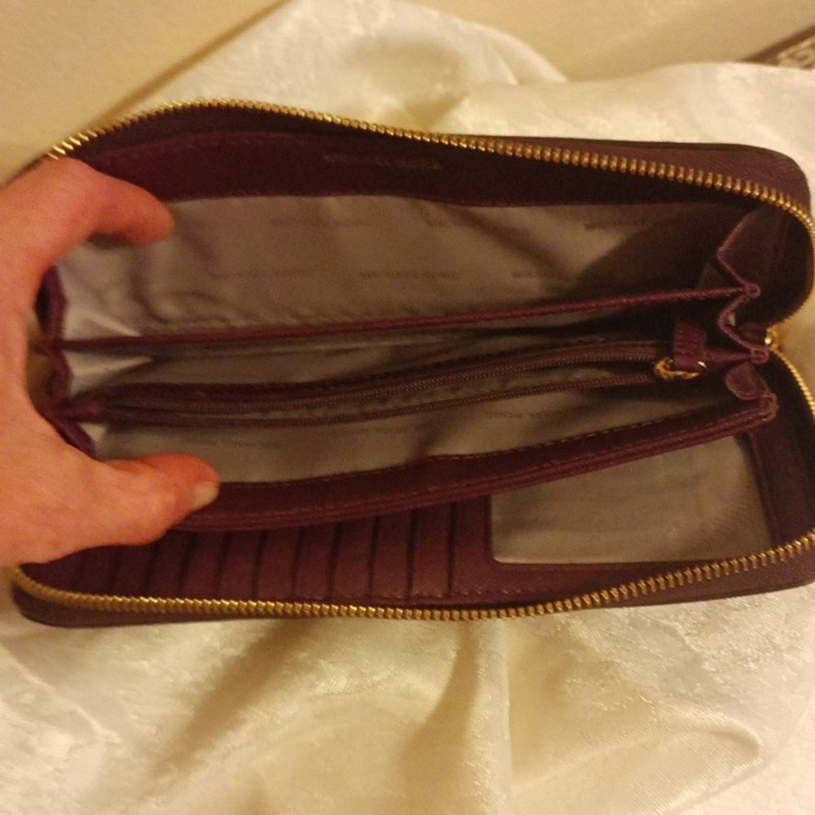 Michael Kors large Saffiano burgundy color leather accordion wallet/ wri…