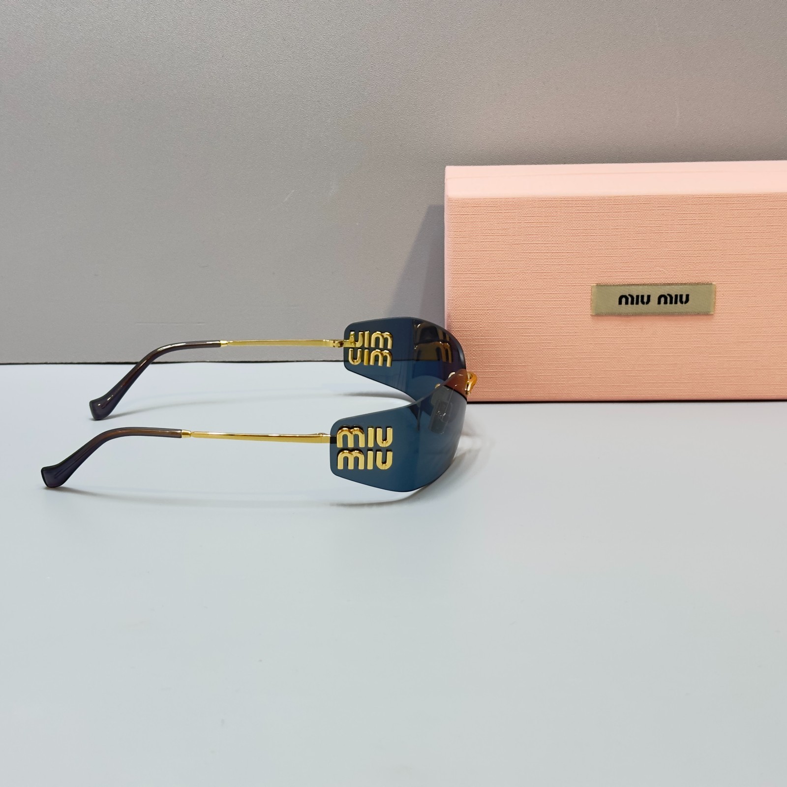Miu Miu MU A51S Shield Sunglasses Gold Frame Black Lens Logo Rimless New W/Box