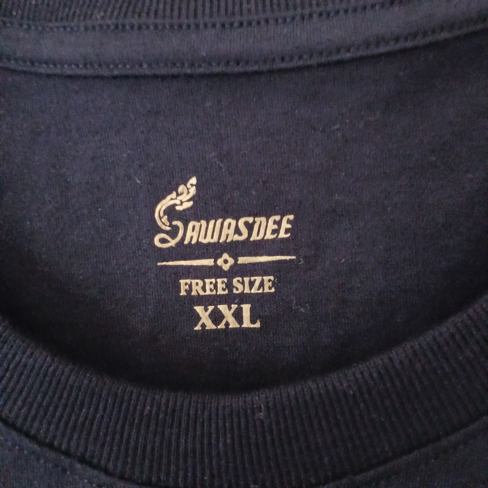 Thailand souvenir shirt featuring a detailed gold-colored elephant