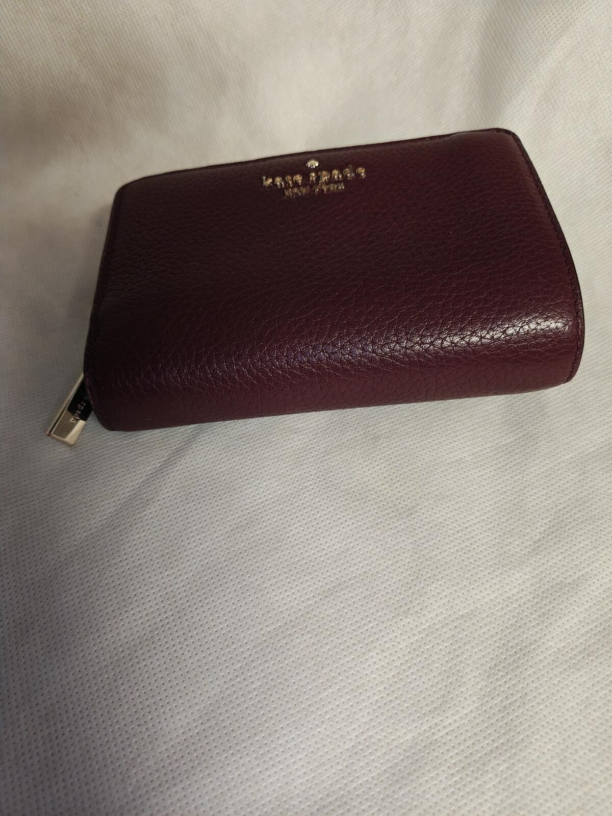 Kate Spade New York Burgundy Pebbled Leather Zip-Around Wallet