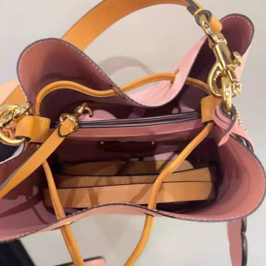 Coach CEA23 Rowan Bucket Bag In Signature Canvas With Charms Powder Pink