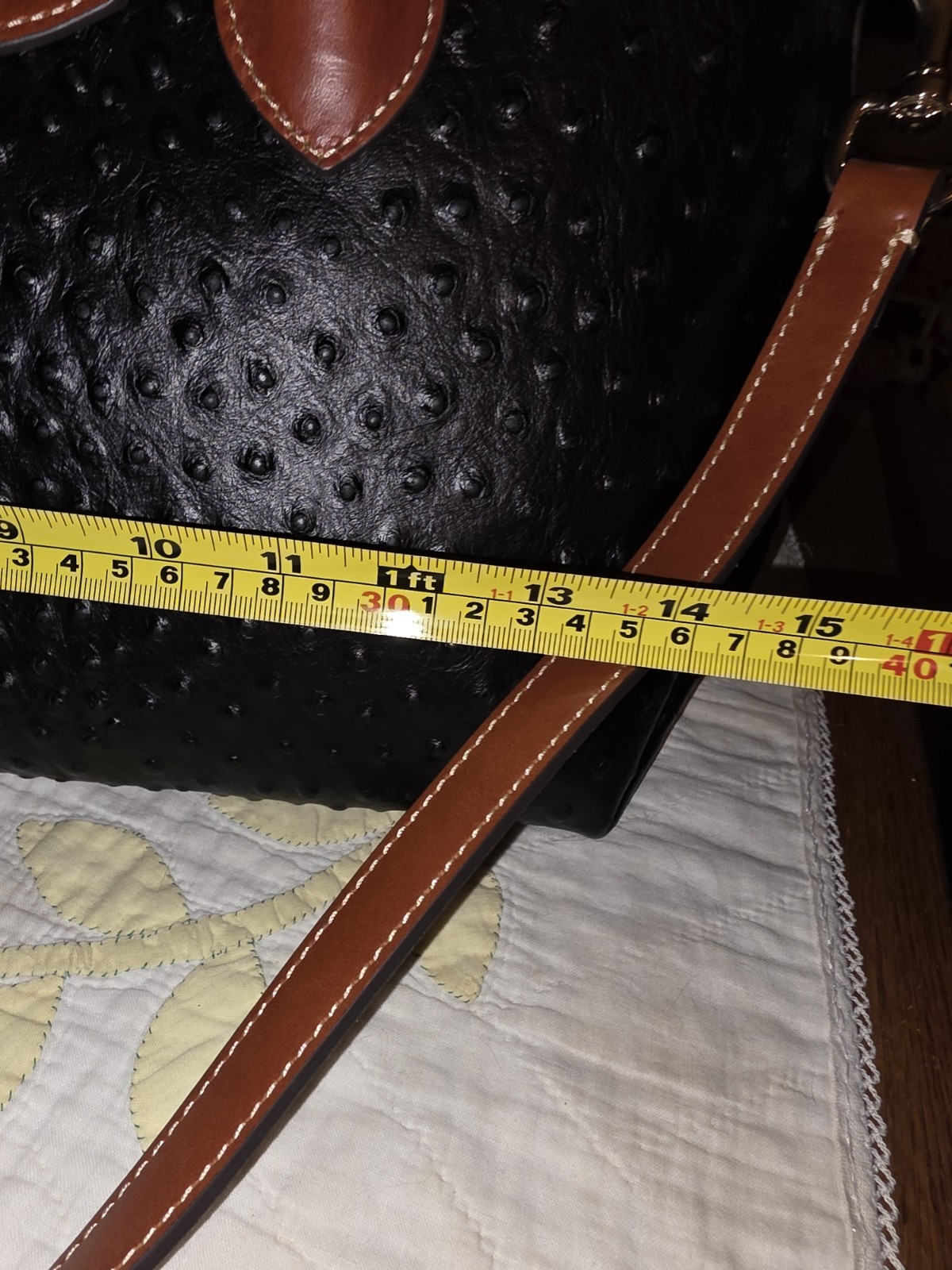 Dooney and Bourke Ostrich Turnlock Flap Handle Tote Black with Brown Trim