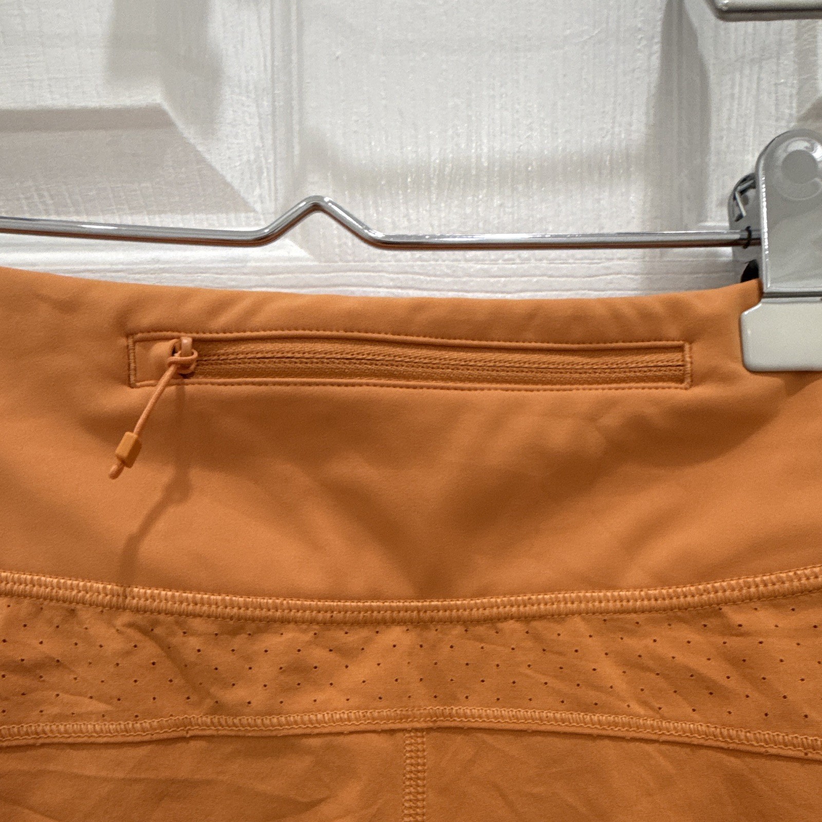 Athleta Women’s Run With It Orange 3.5in Running Shorts Drawstring Pockets