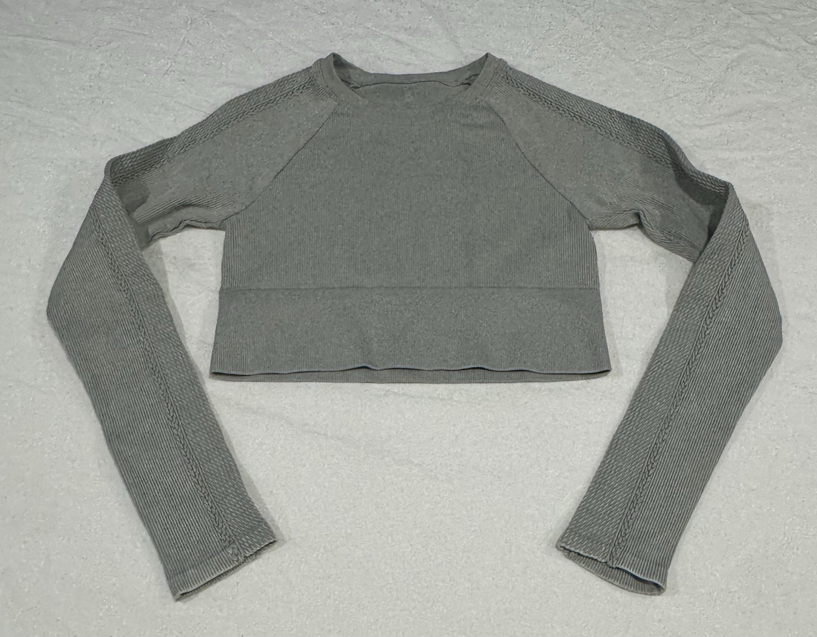 Offline by Aerie Big Chill Seamless Long Sleeve Crop Top in a grey/stone color