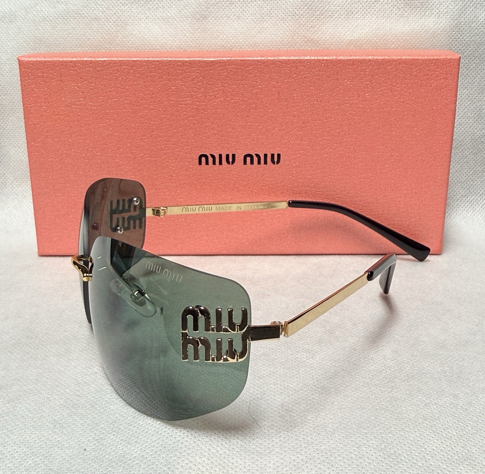 Miu Miu Women’s Rimless Shield Sunglasses Gold Metal Frame Green Gradient