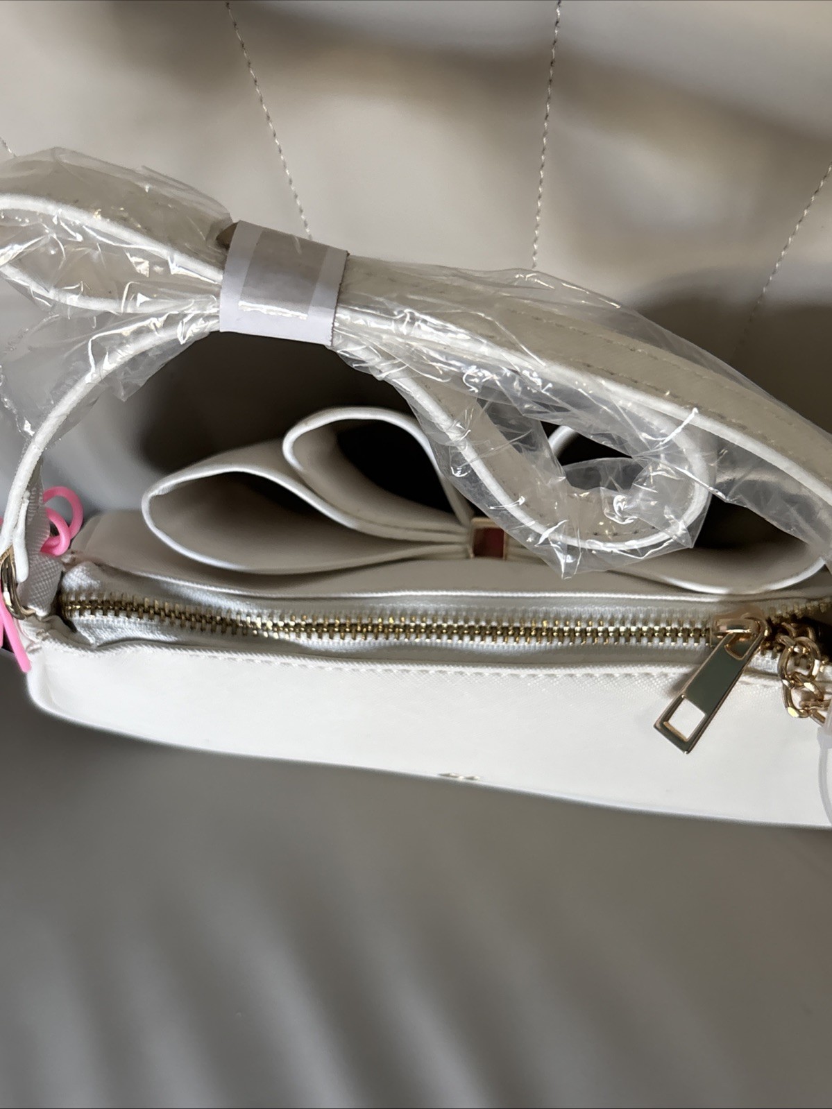 Like Dreams Bowtie Crossbody White Faux Leather Flap Chain Strap Gold Logo