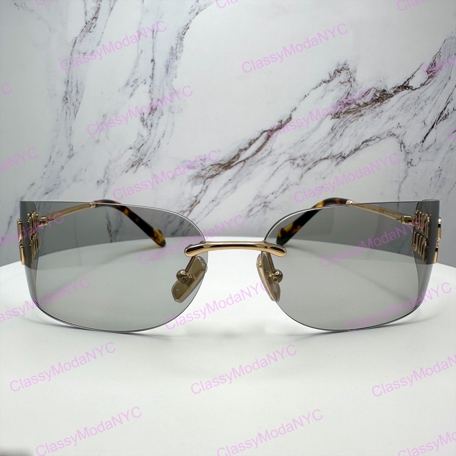 New MIU MIU Sunglasses Gold Slim Runway Wrap Rimless MU A51S 5AK50K Authentic