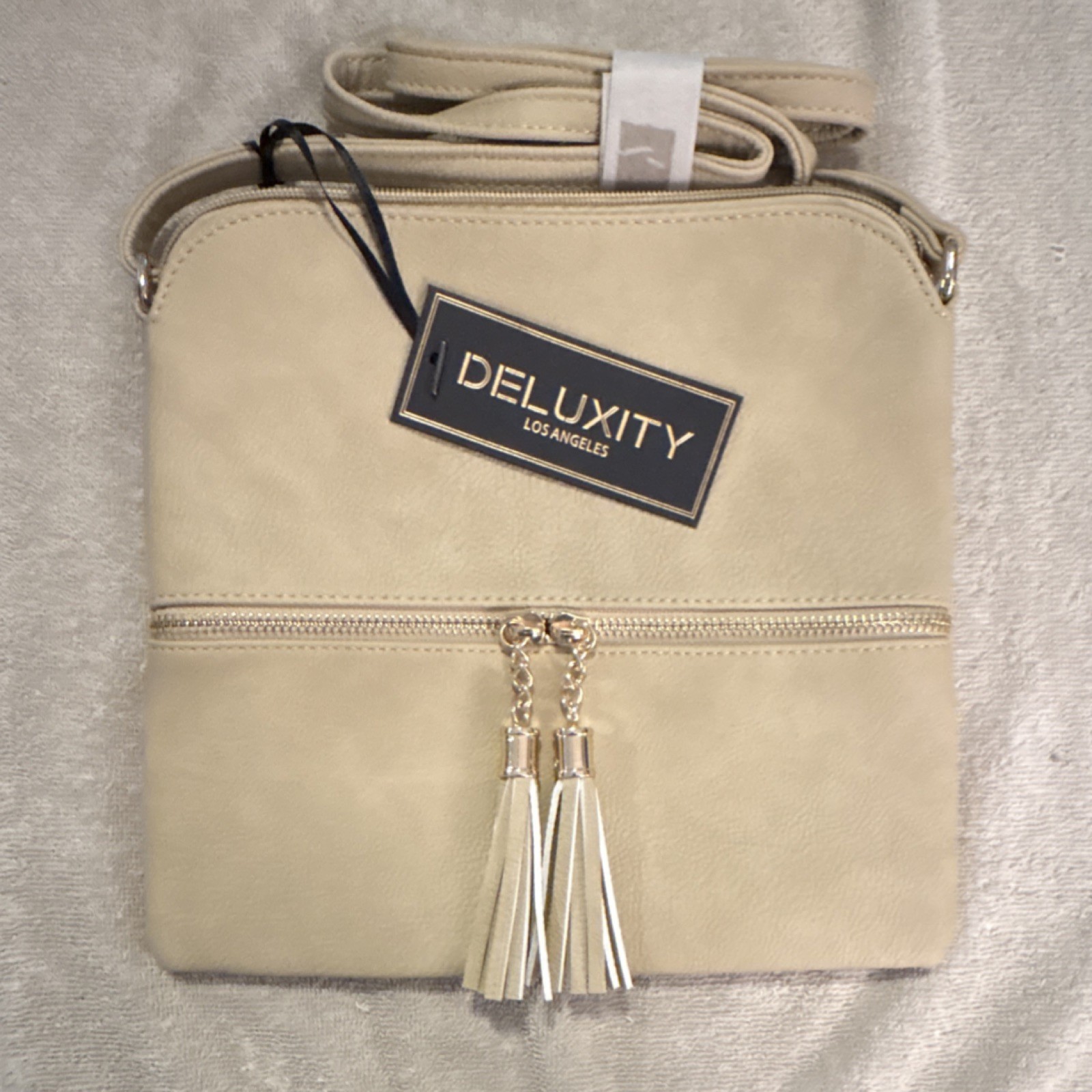 Deluxity Beige Crossbody Bag Tassel Zipper Accents Adjustable Strap