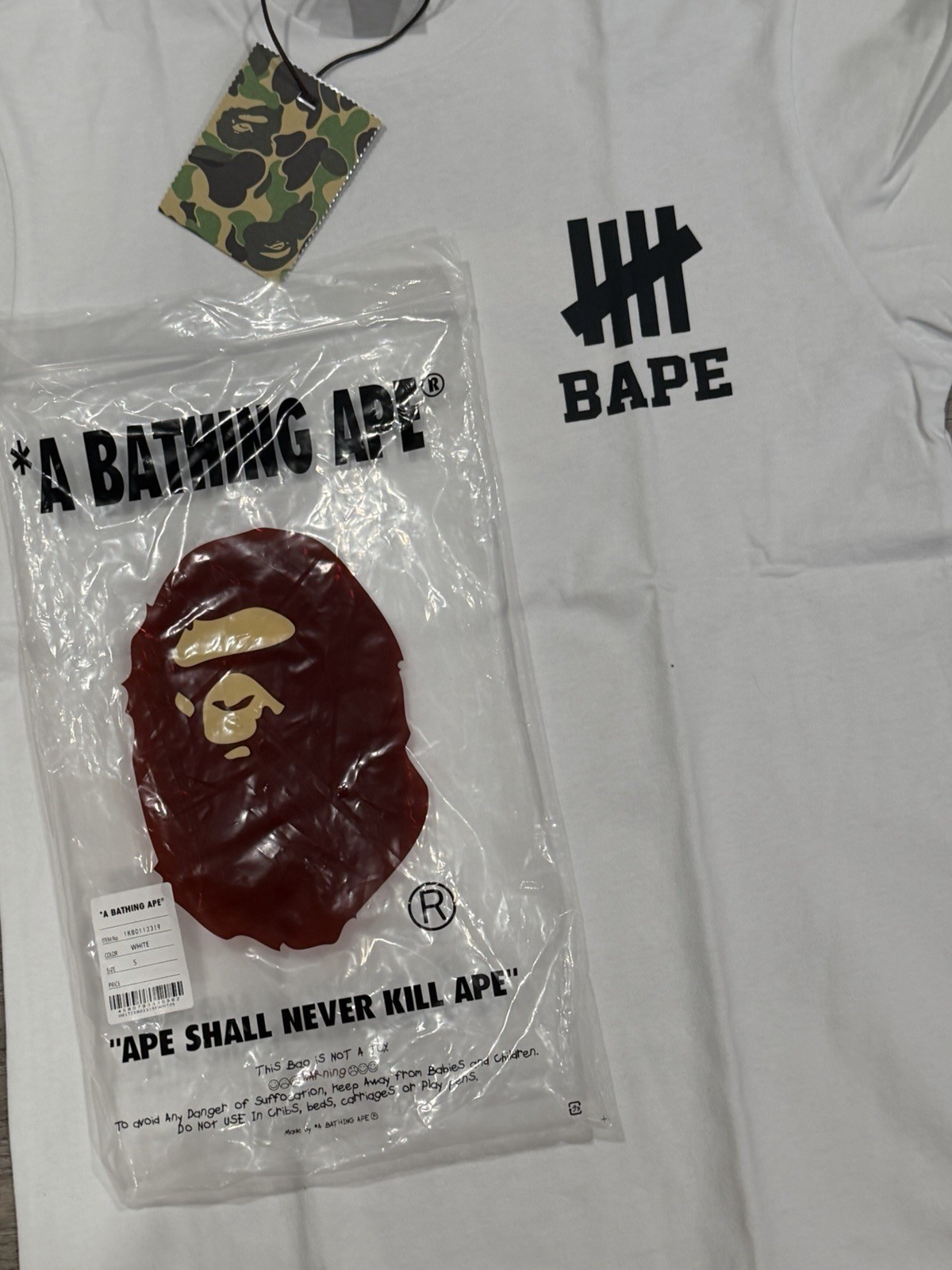 BAPE × undefeated logo T-shirt White A Bathing Ape Size S