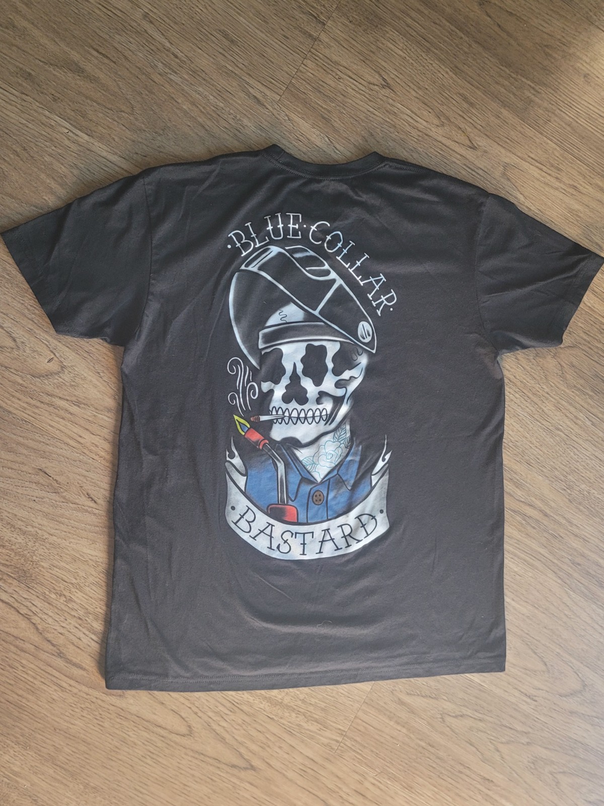 TROLL CO. men’s black t-shirt SIZE: L “blue collar bastard” graphic on the back