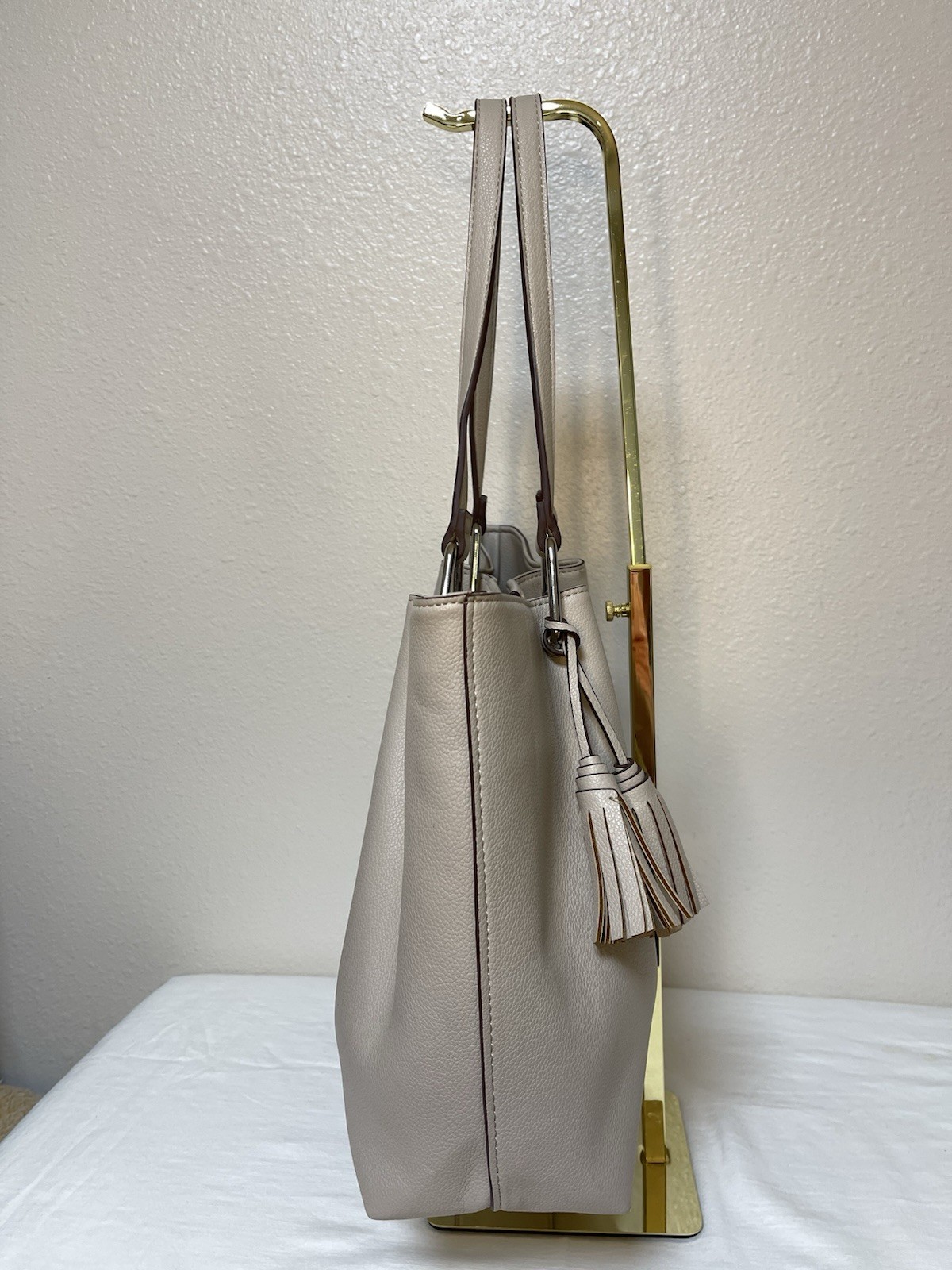 Anne Klein Taupe Vegan Pebbled Texture Tote with Lion and Tassel Charms