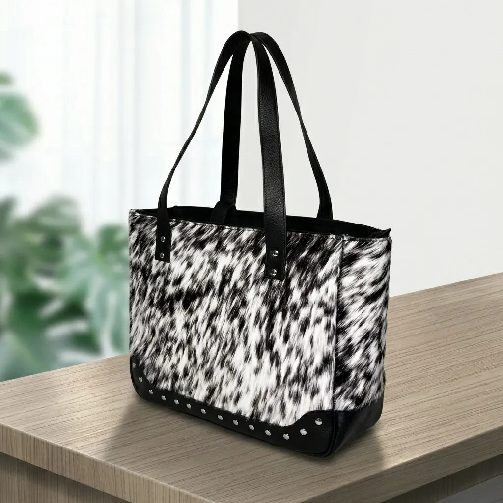 natural-black-and-white-speckled-hair-on-cowhide-leather-bag