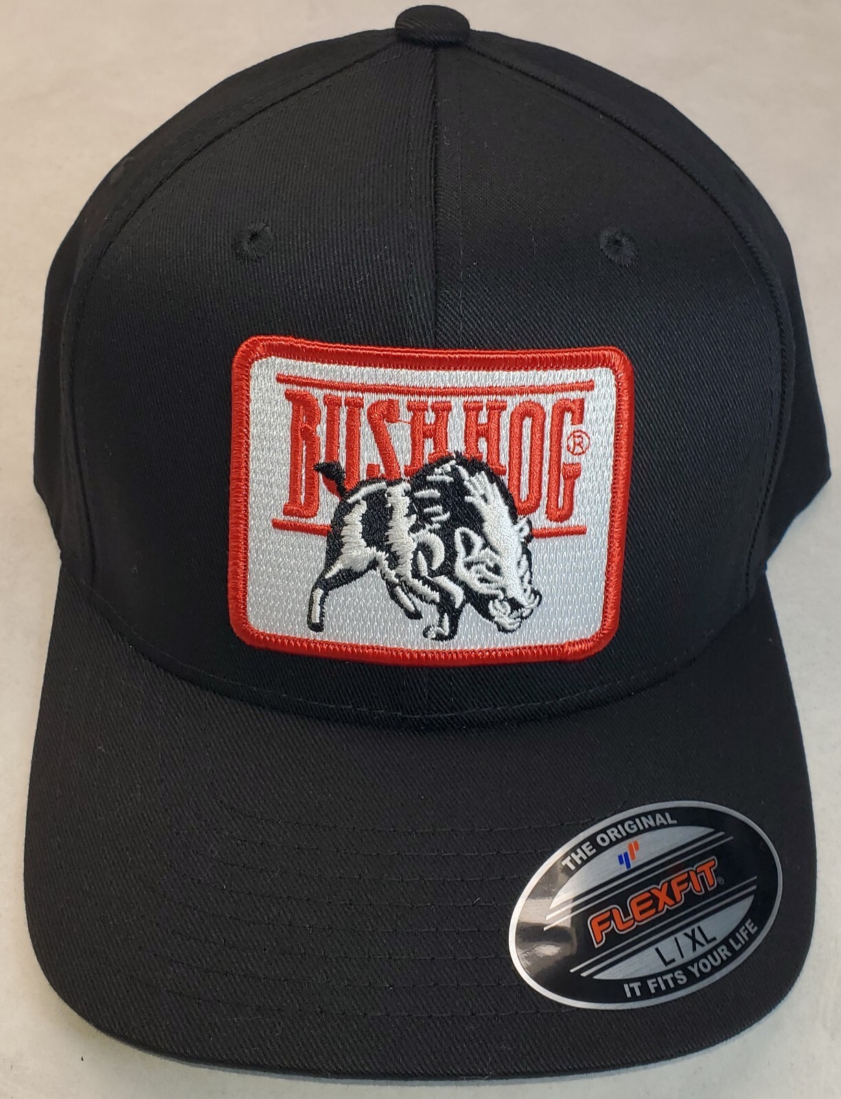 Bush Hog Patch on Flexfit 6277 Black Hat L/XL 7 1/8 – 7 5/8″