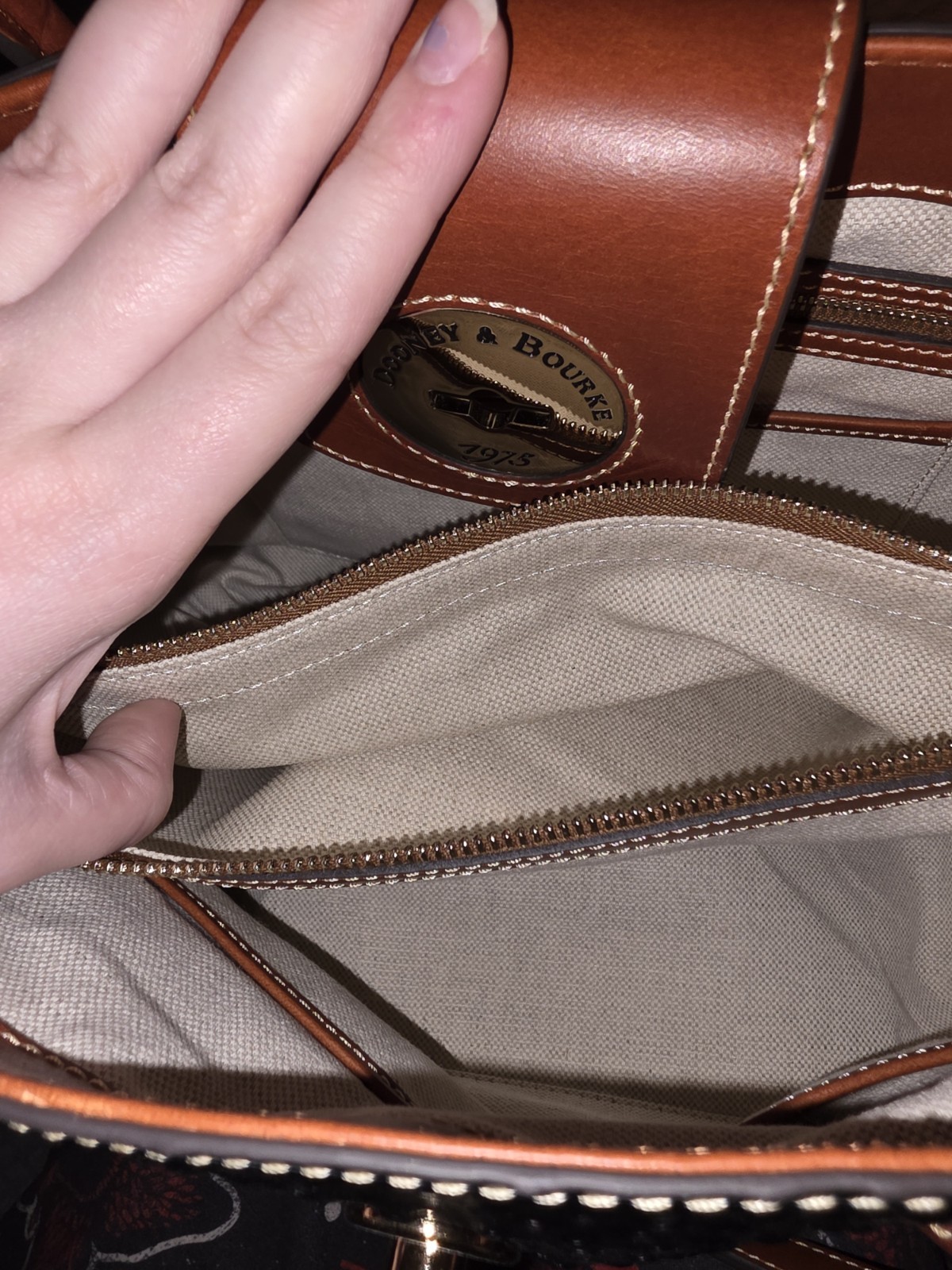 Dooney and Bourke Ostrich Turnlock Flap Handle Tote Black with Brown Trim