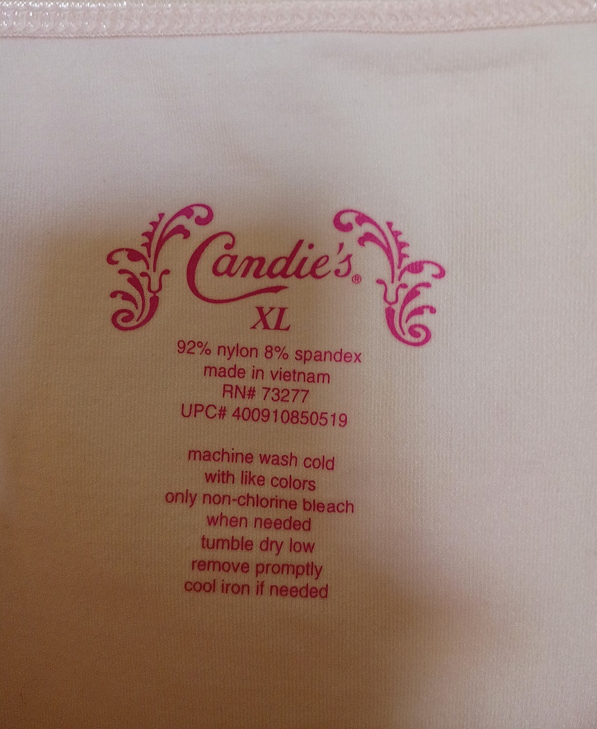 Candie’s 92% nylon, 8% spandex solid pink camisole XL