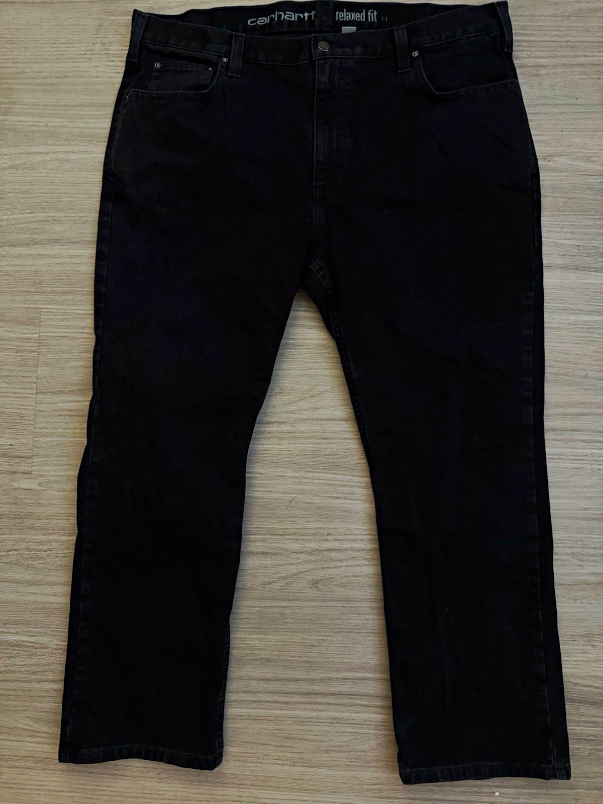 The Carhartt Men’s Black Denim Jeans are designed for comfort and durability. Ma