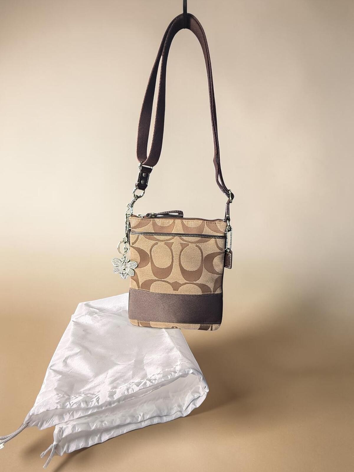 COACH Signature Stripe Swingpack Crossbody Khaki Brown Canvas